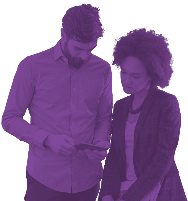 Photo of man and woman looking at a tablet together