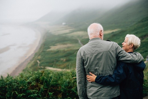 Older couple over scenery - Educators Financial Group